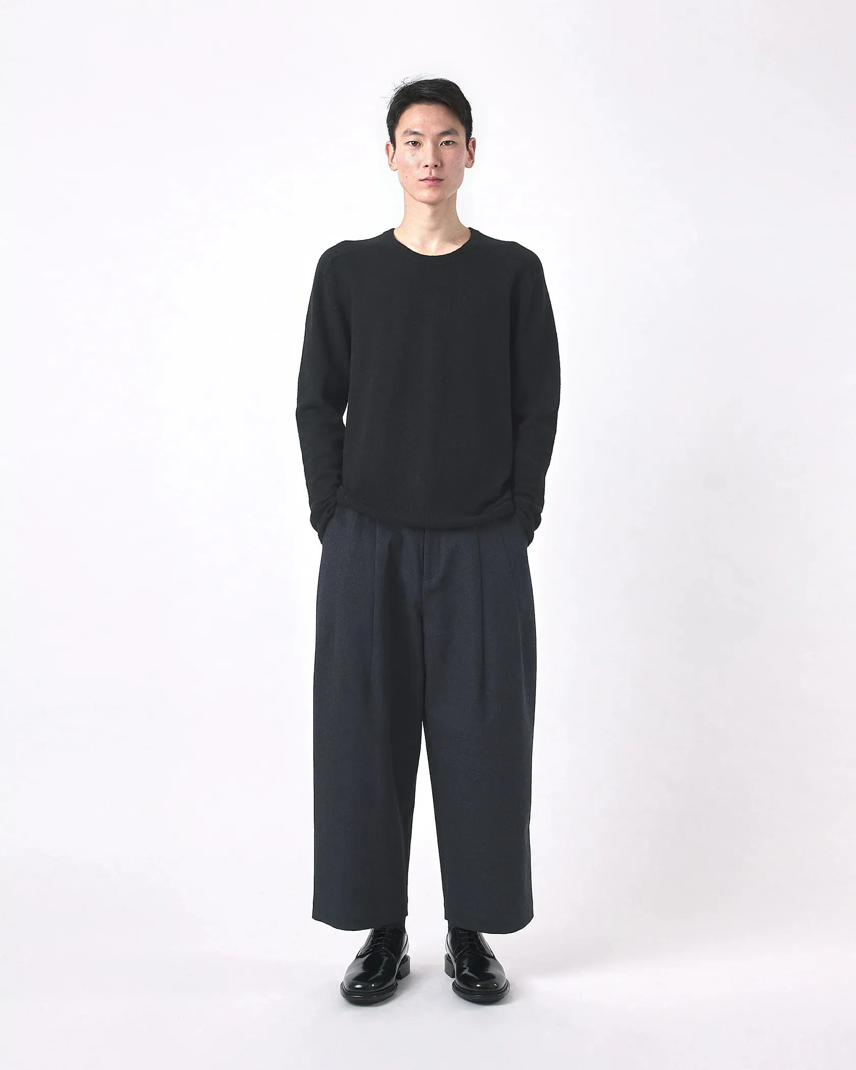 7115 by Szeki Black Curved Shoulder Crewneck Sweater