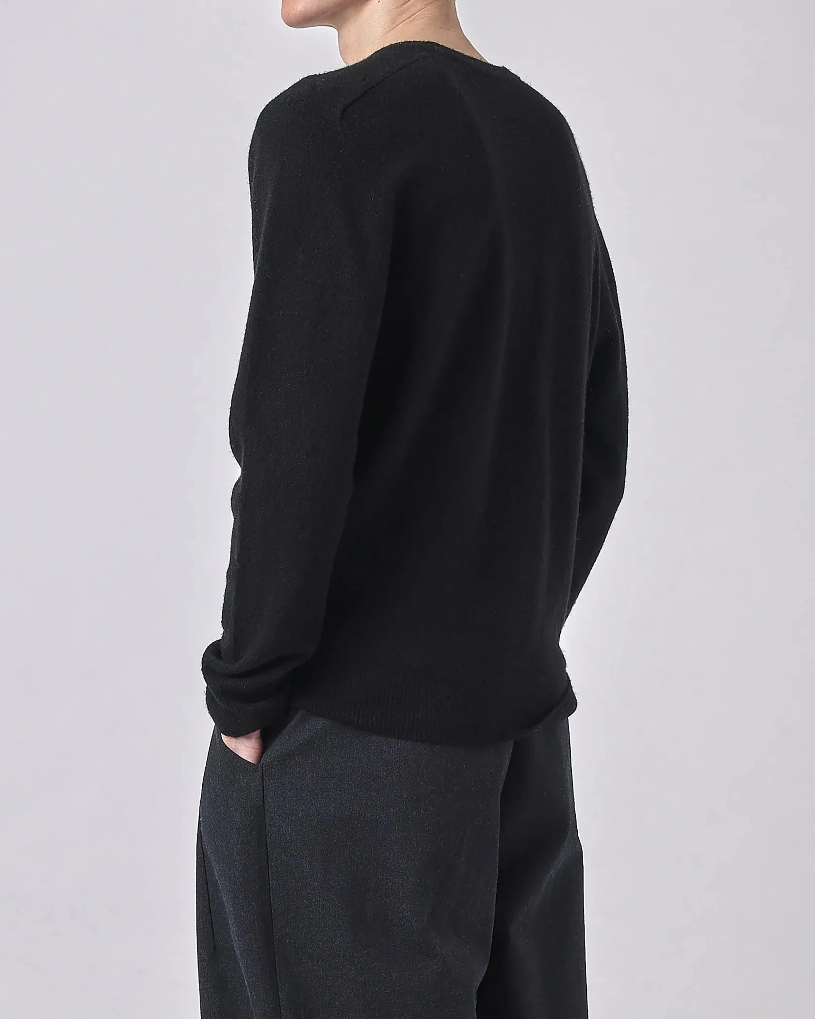 7115 by Szeki Black Curved Shoulder Crewneck Sweater