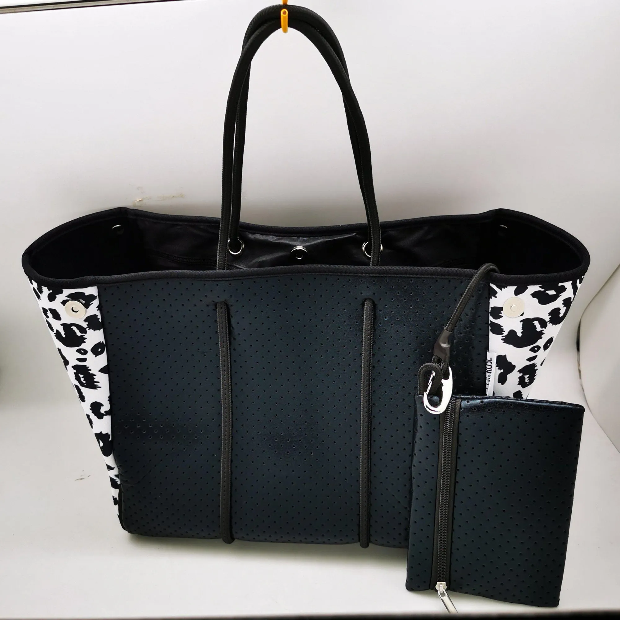 THE DYANA - BLACK & WHITE LEOPARD NEOPRENE BAG